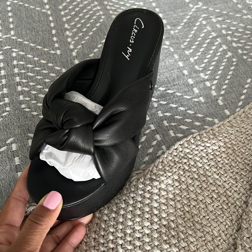 Womens black man made material platform sandals, never worn.